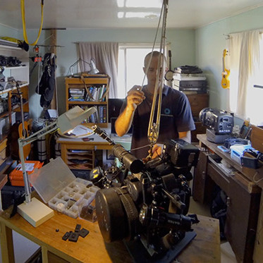Underater video equipment setup with Gates GL14 lights on a Z100 housing, with custom-built tripod and homemade lift