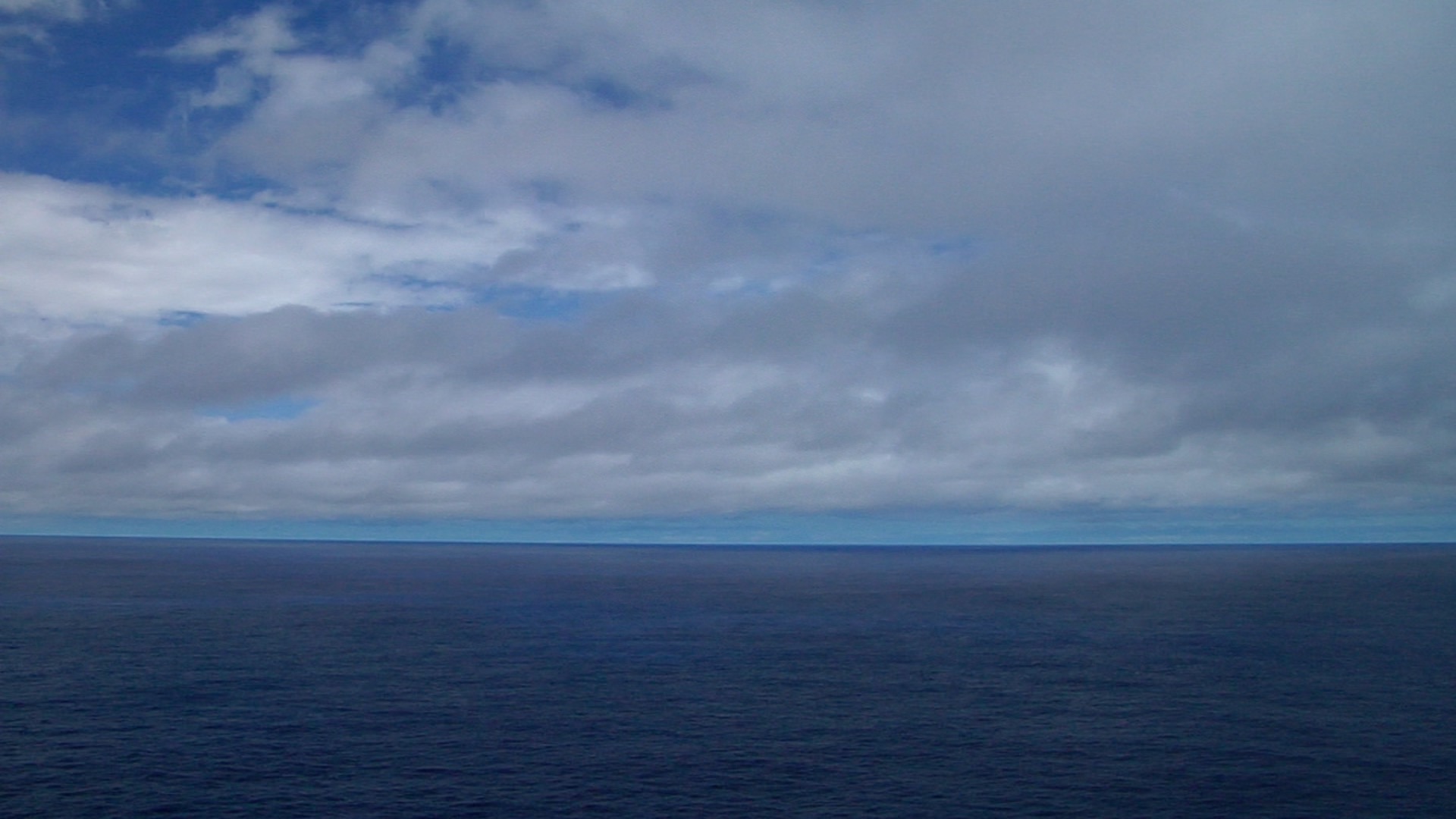 Clouds changing rapidly over ocean, HD, UP16098