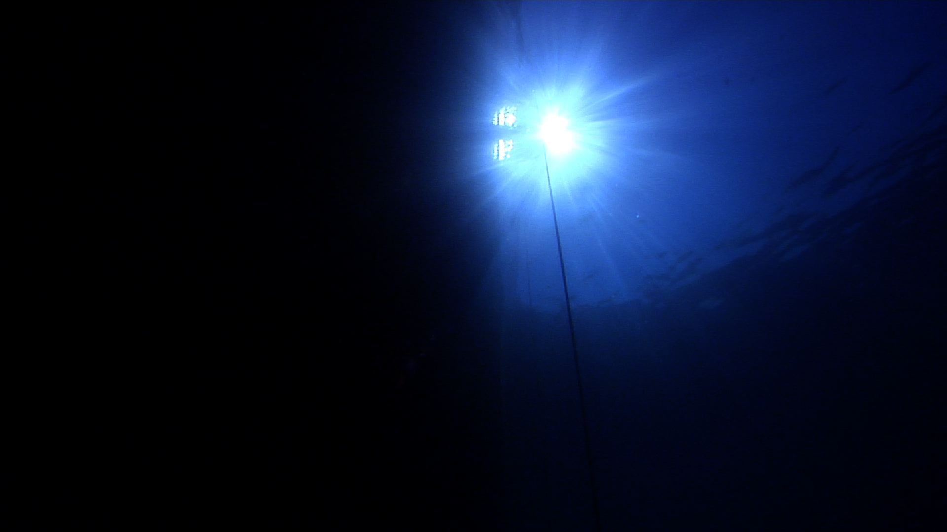 Ocean scenery sun ball and sunrays against ship hull, calm sea surface, in bluewater, HD, UP31647